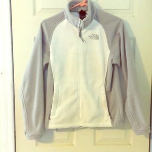 White and grey Northface jacket